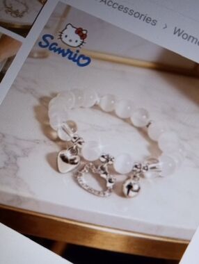 $4>>>>Sanrio White Beaded Bracelet with Silver Heart and Bell Charms